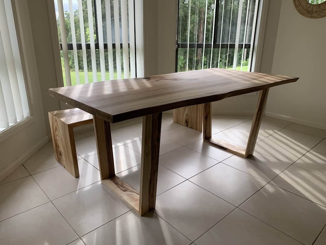 custom-dining-table-bench-view-3 Front view of a live edge dining table and bench of a live edge dining table