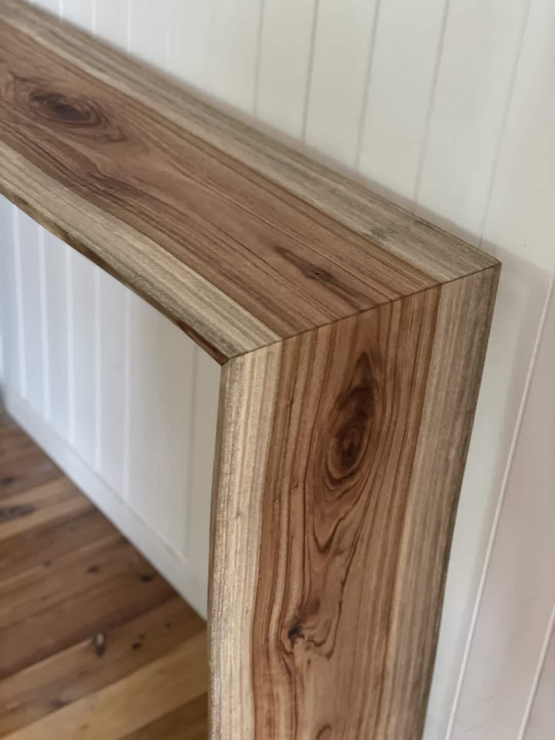 live-edge-coffee-bar-veiw-1 Close up photo of 45 degree mitre cuts showing part the top and leg