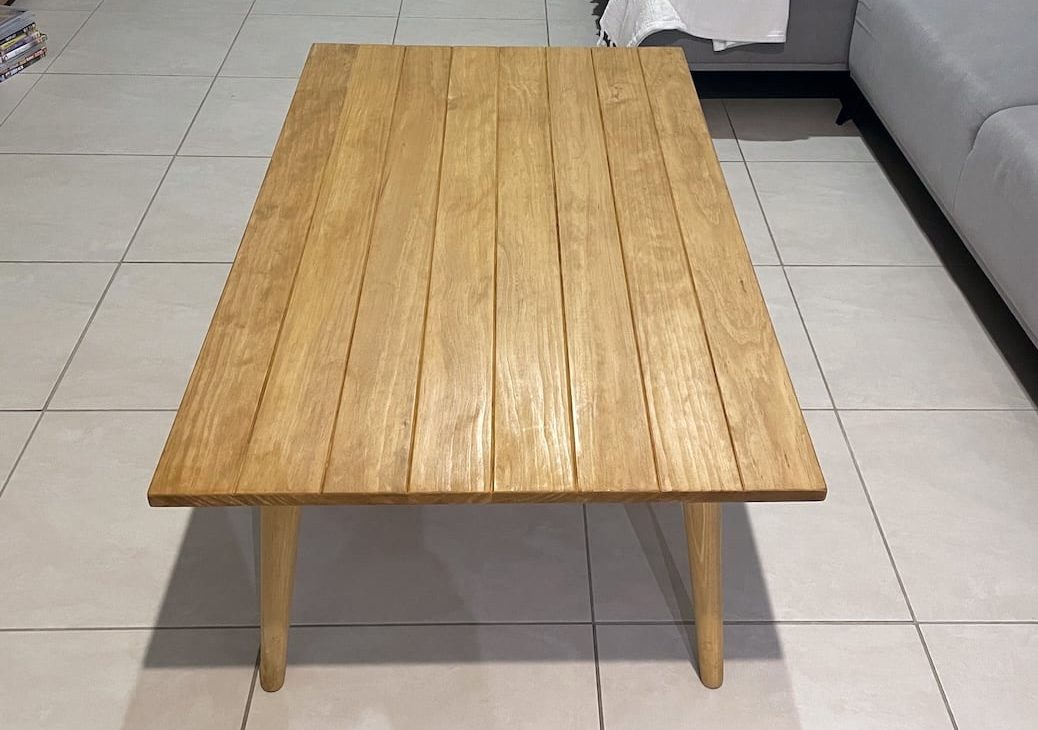 coffee-table-view-3 Side view of the shiplap coffee table with round tapered legs finished with hard wax oil for a natural finish