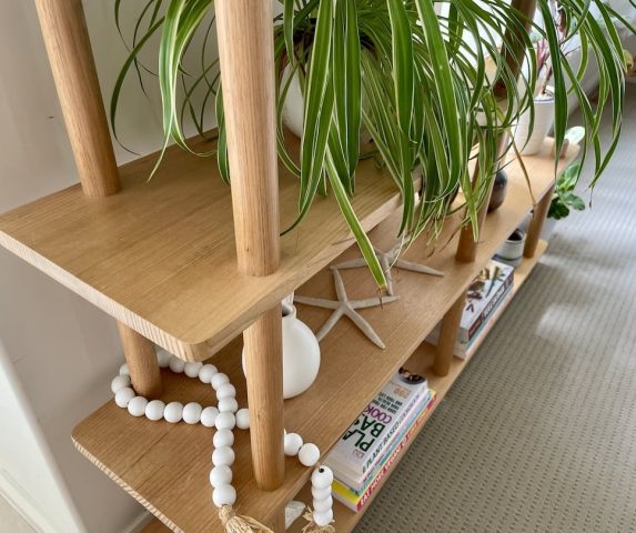 custom-biult-bookshelf-view-1 Close up photo of the Tasmanian Oak bookshelf showing the bookmatched timber panels