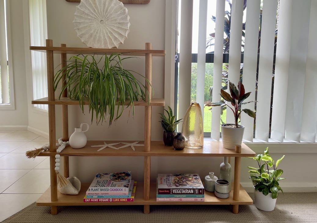 Custom made Tasmanian Oak bookshelf with 3 shelves by the window front view