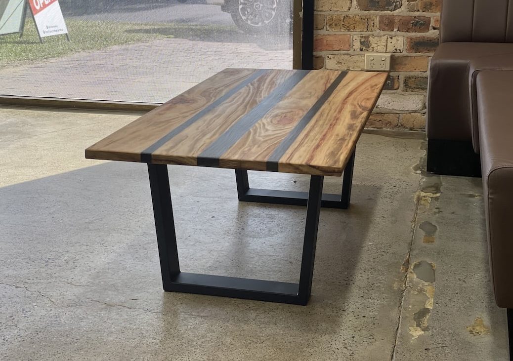 Showing the black matt steel legs of he coffee table