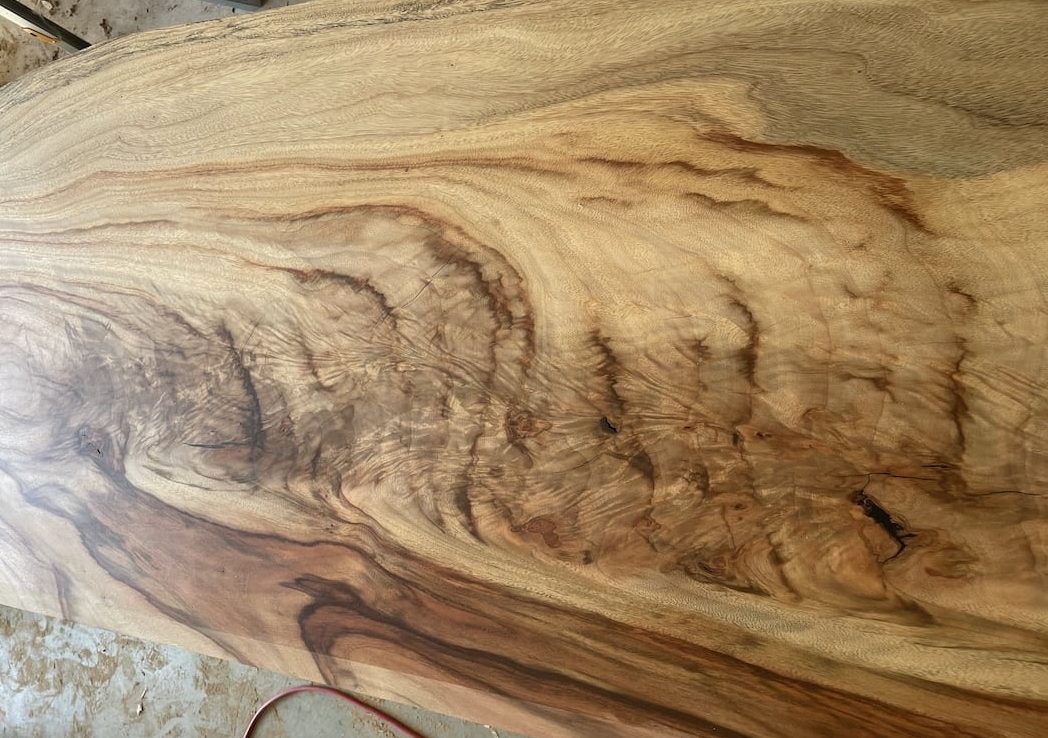 custom-made-study-nook-desk-view-2 Close us up photo of the live edge Camphor Laurel slab finished with hard wax oil