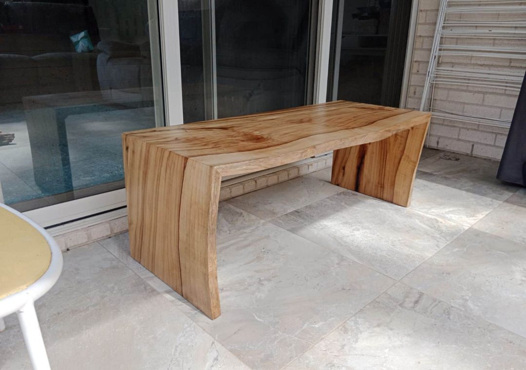 custon-built-pool-bench-view-3 Custom build Camphor Laurel outdoor bench finished with exterior resin